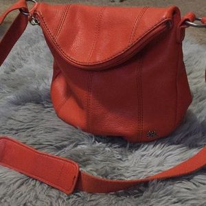 The Sak Orange purse with lots of organization!